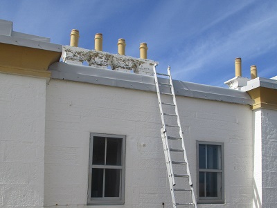 Students painting Covesea Lighthouse Lossiemouth